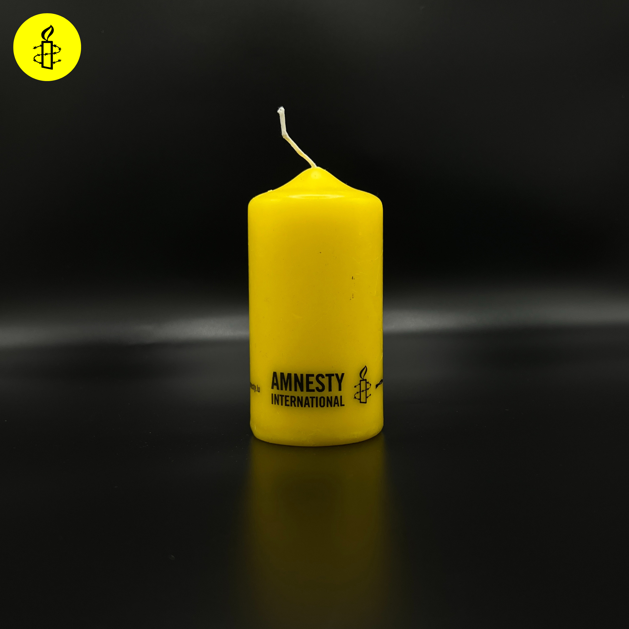 Grande bougie jaune  Amnesty International Luxembourg Amnesty International
