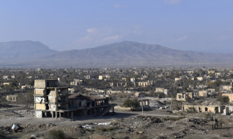 Edit: This picture taken on November 27, 2020 shows destroyed buildings in the town of Aghdam. - The territory is due to be returned to Baku as stipulated in a Moscow-brokered peace deal signed by Armenia and Azerbaijan on November 9, 2020. As part of the deal, Armenia and Nagorno-Karabakh must return the Aghdam, Kalbajar and Lachin districts to Azerbaijan starting on November 20, 2020 with a completion deadline of December 1, 2020. (Photo by STRINGER / AFP) (Photo by STRINGER/AFP via Getty Images)
